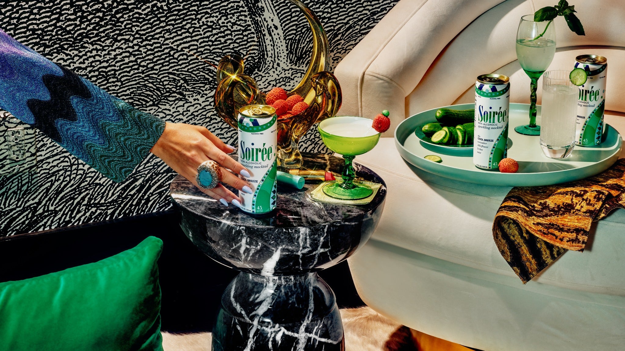 Cool Breeze cans and cucumber mocktails in a stylish lounge